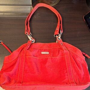 EUC Baggallini Hampton shoulder bag in a burnt orange nylon material WITH BRIGHT